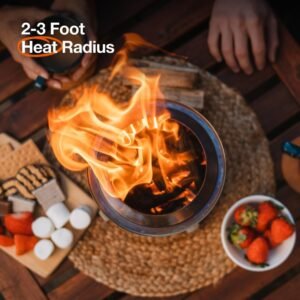 Small smokeless tabletop fire pit glowing on a table at dusk
