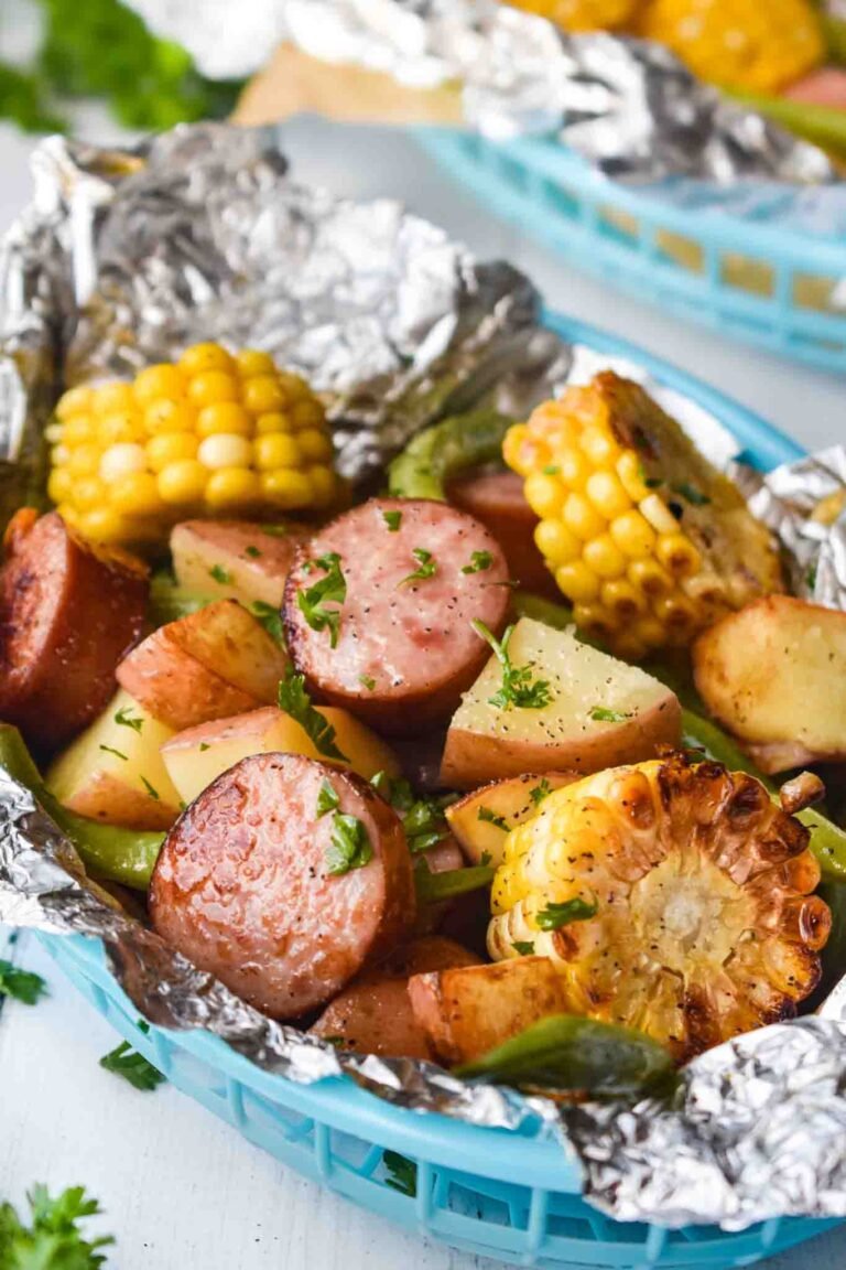 Foil packet sausage and potatoes with corn and peppers